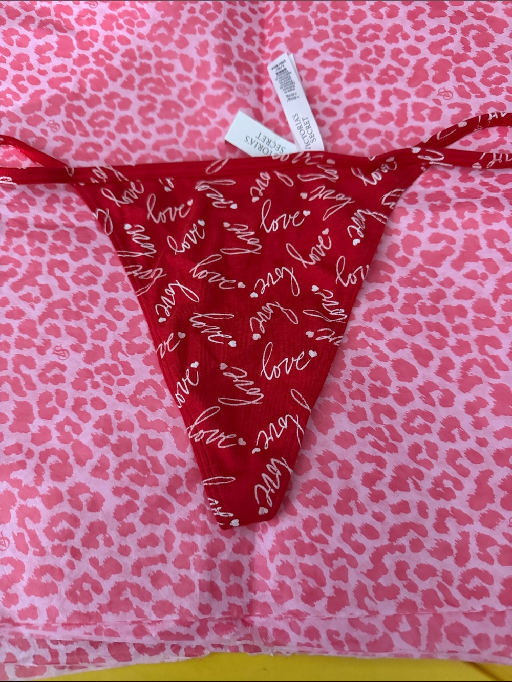 Victoria’s Secret red 'Love' Script V string L NWT